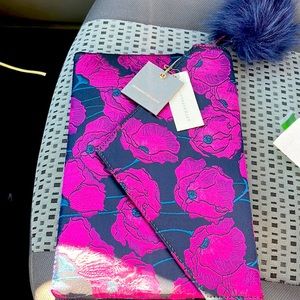 MONSERAT DE LUCCA 
Purple anthropology clutch